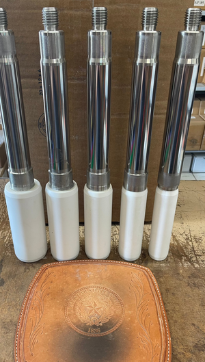 3364 GASO Ceramic plungers. 1 1/2. 1 3/4, 2, 2 1/4, 2 1/2" Sizes shown standing side by side. SS Stingers. Male thread. White ceramic.