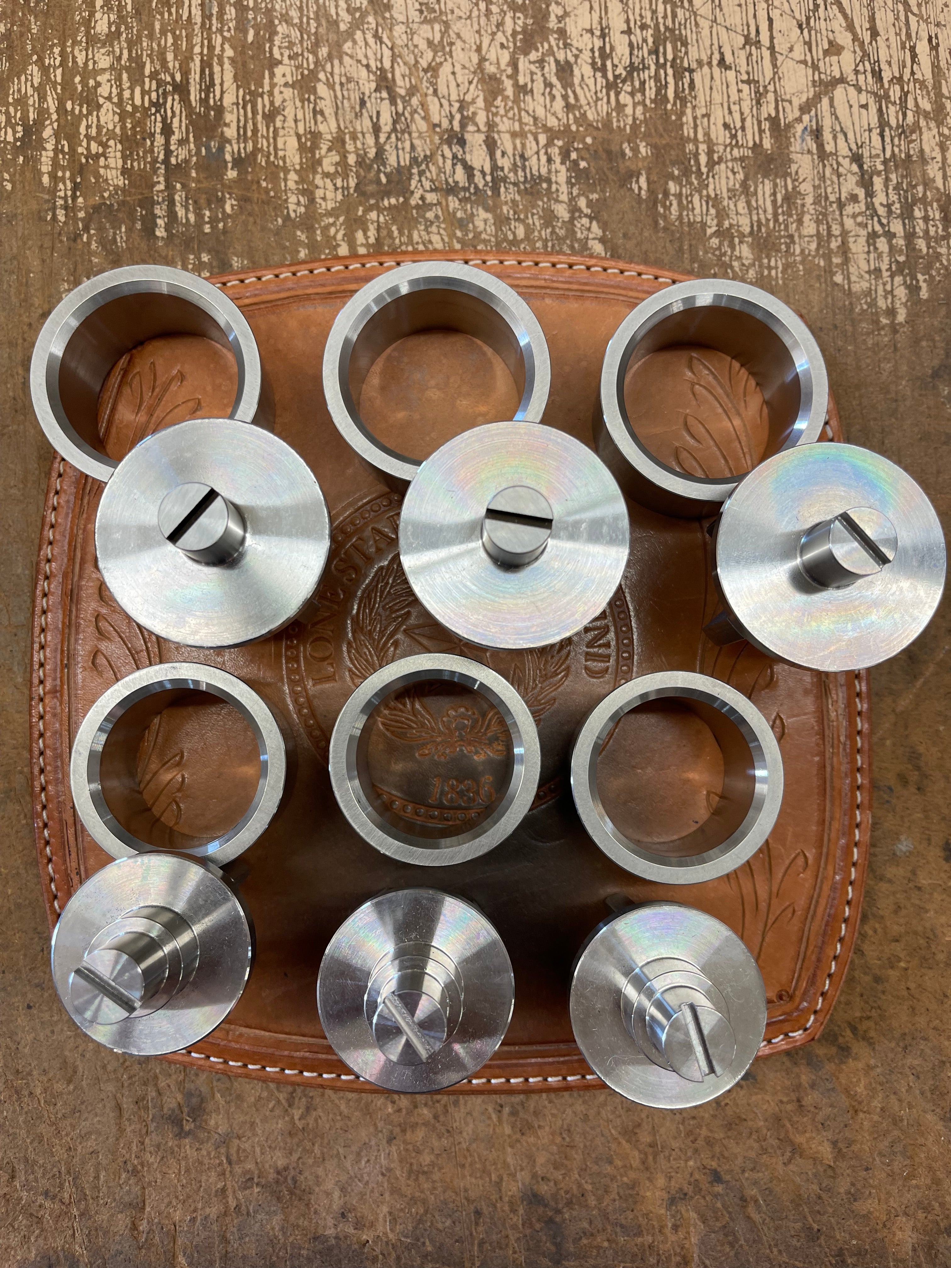 Stainless Steel Wing Guided Valves and seats for a 3364 GASO and 3211 GASO Small Suction valve assy. Members removed from seats Small suction top view