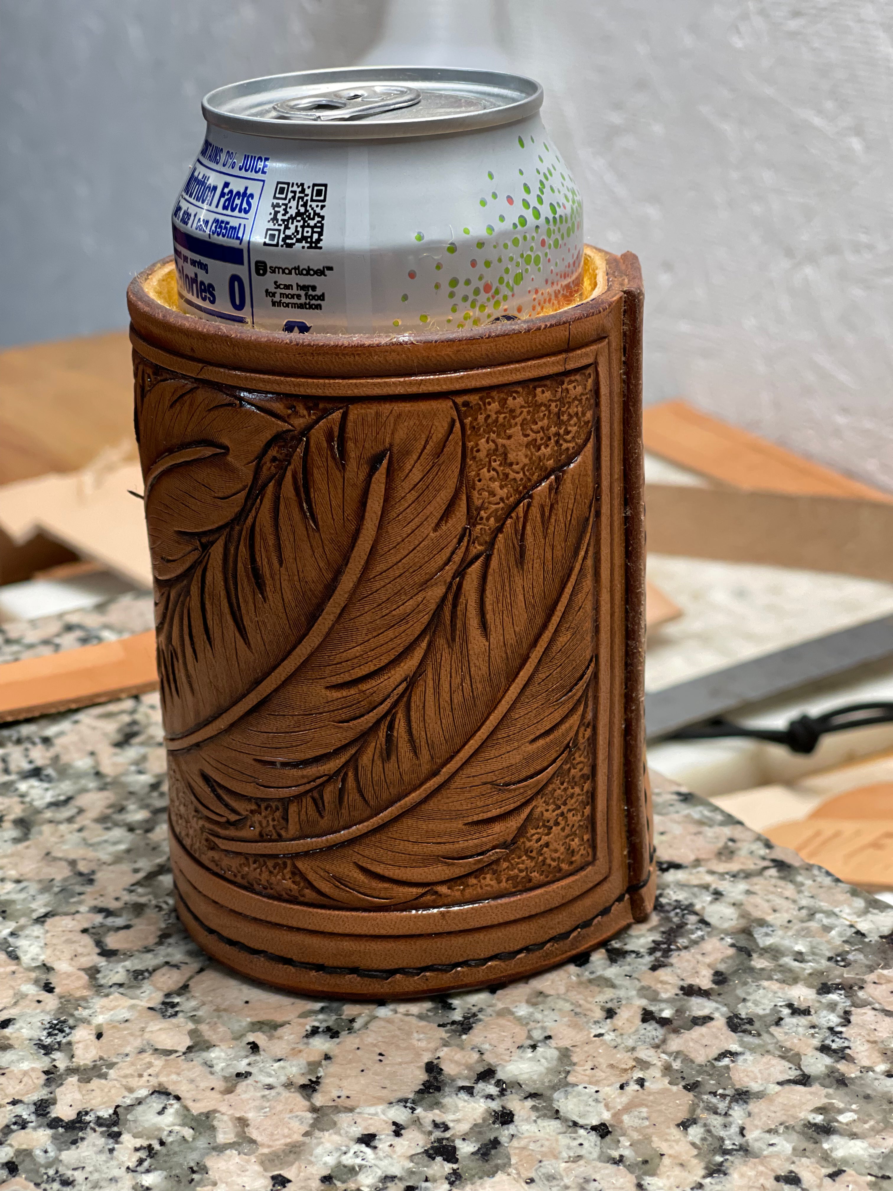 Feather tooled, shearling lined drink coozie