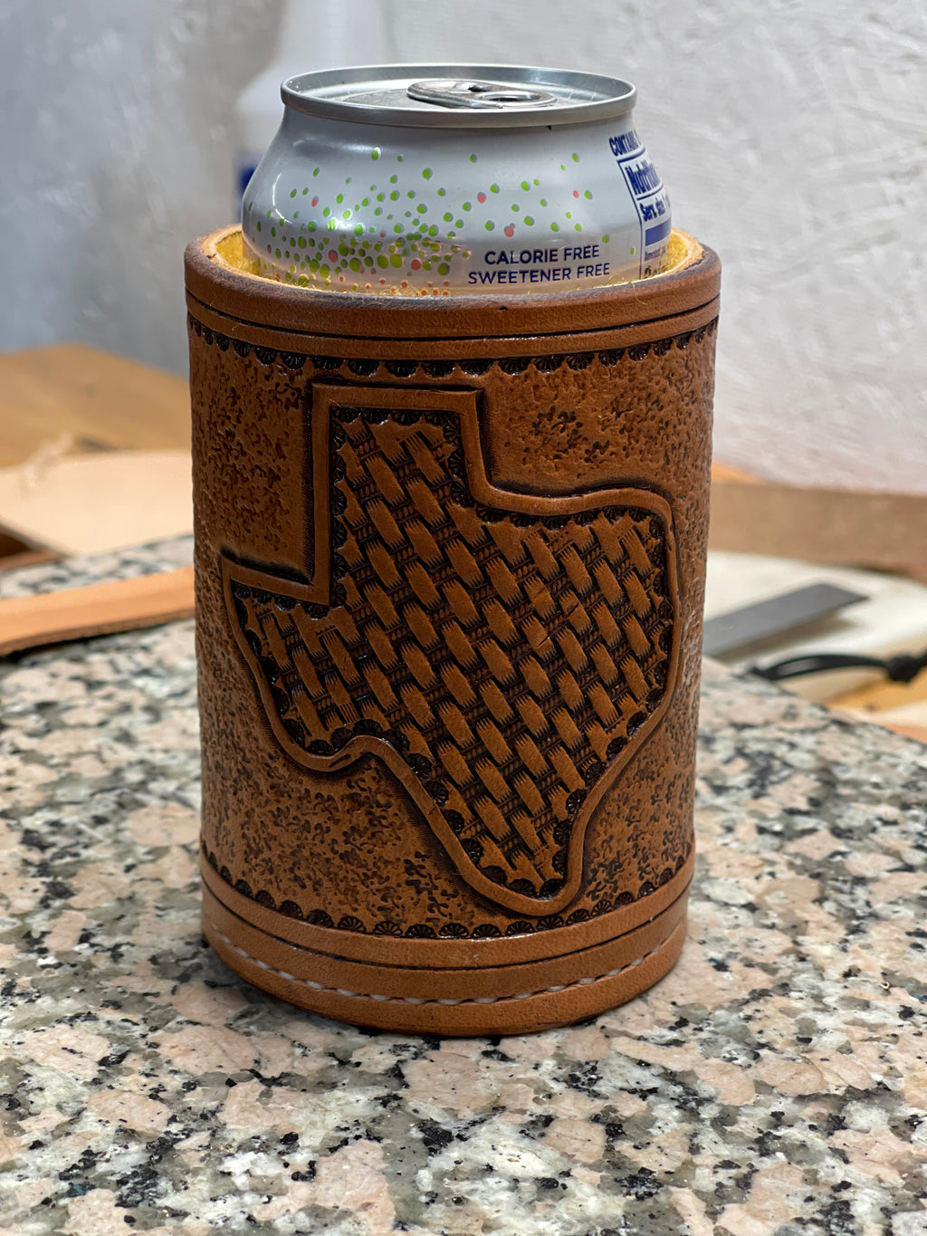 Texas tooled, shearling lined drink coozie